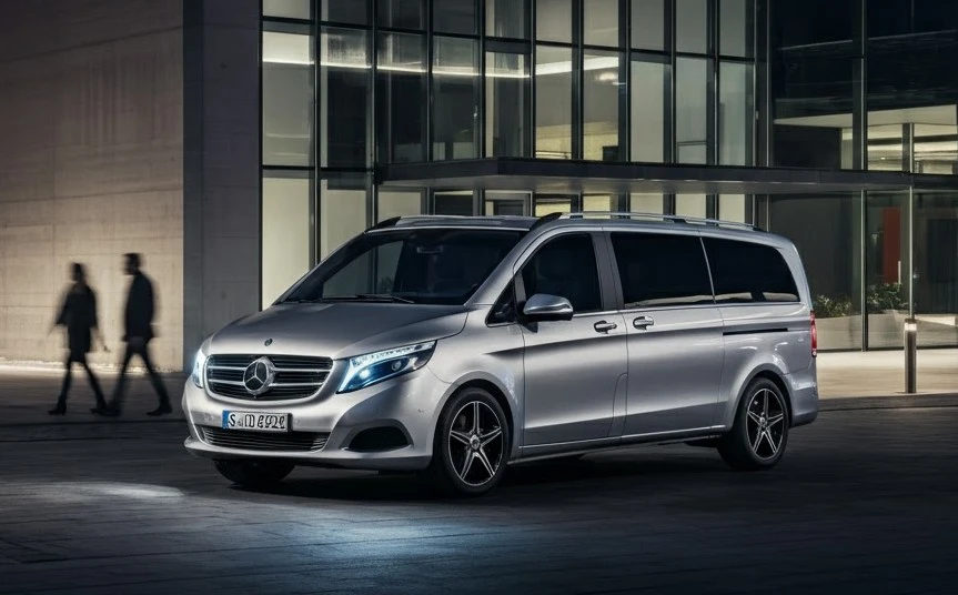 Chauffeur GetYourRide accueillant un client à l'aéroport